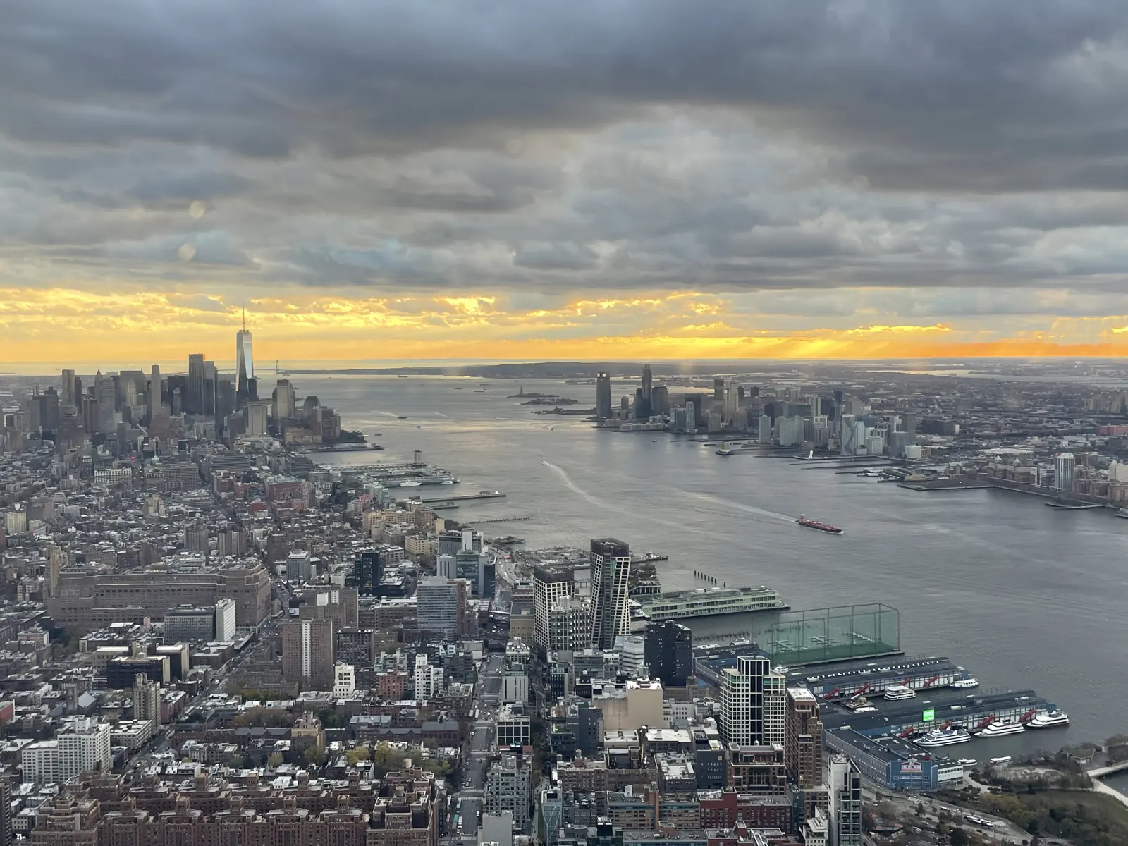 The Hudson River and Manhattan's West Side piers at sunset, seen from above